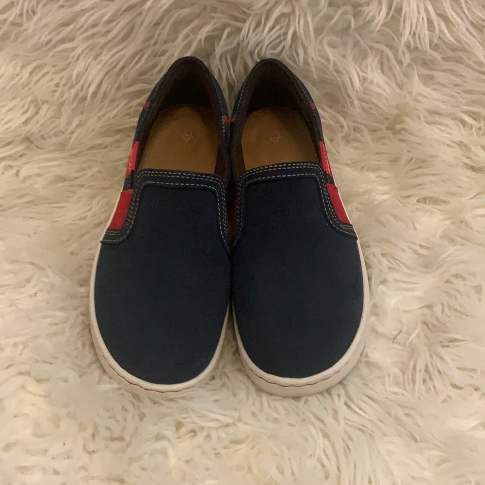 Ariat blue and red Cruisers.